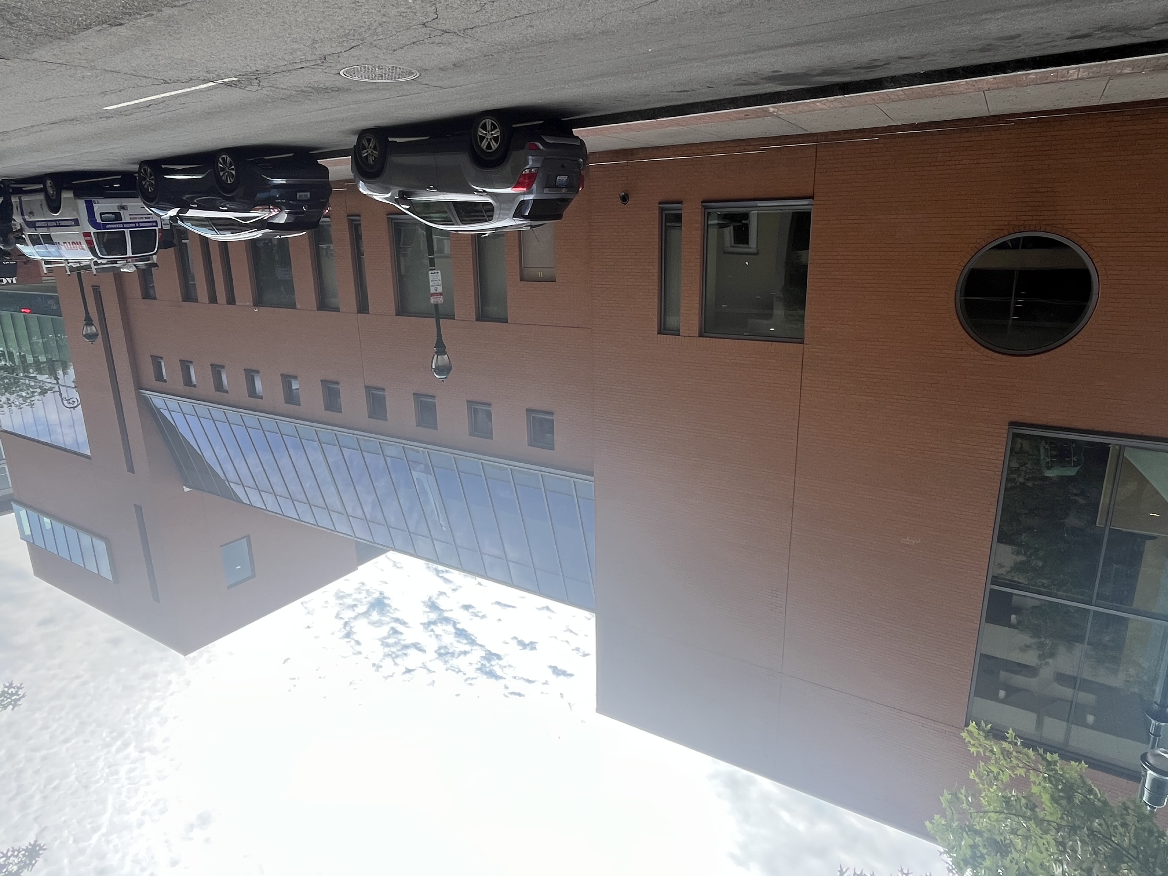 Side exterior of Co-op High School on Crown Street. Note various window shapes.