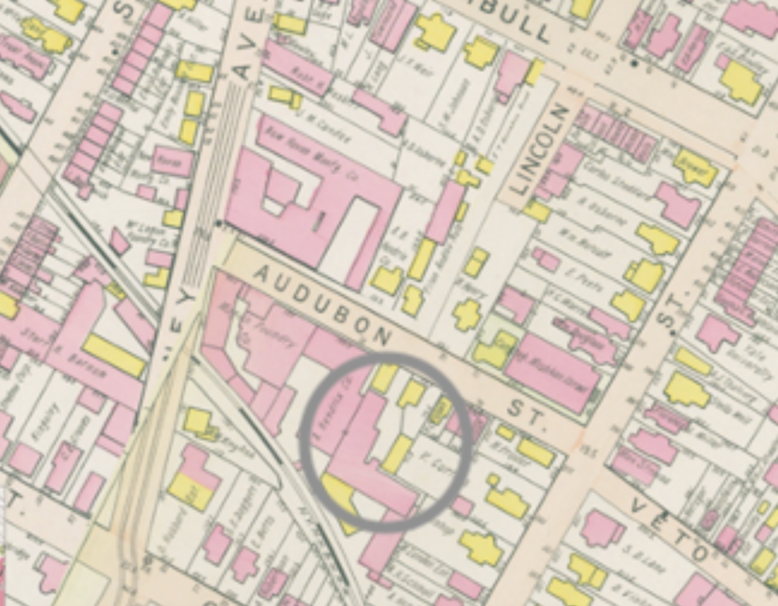 1911 Sanborn Map: The lot that currently houses the Community Foundation Building (grey circle) is shown to contain 3 small buildings and a large L-shaped on back in 1911. 