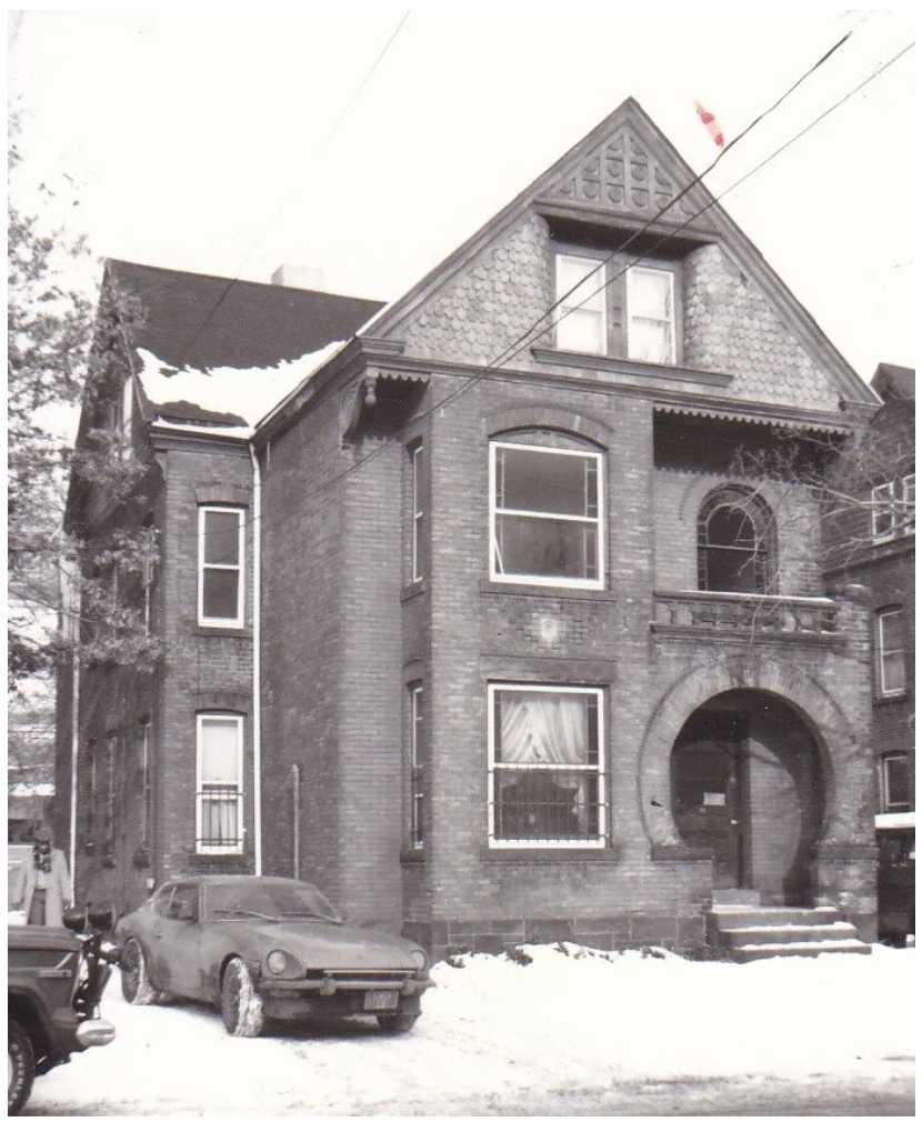 73 Lake Place, the Twin of 71. It has the same Queen Anne architecture with the brick and the roof. 